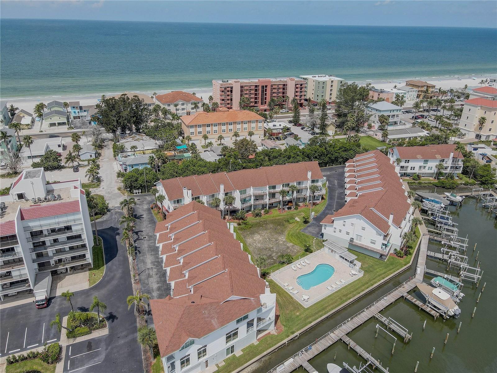 Experience the best of coastal living with stunning water views in this beautifully remodeled 3-bedroom, 3-bath townhome, ideally located just steps from the Intracoastal Waterway and a short stroll to the beach. With the lowest HOA fees on the water at just $305/month, this fully furnished, move-in-ready home offers a rare combination of style, comfort, and practicality. All you need is your toothbrush.
Inside, the open and light-filled floor plan features luxury vinyl plank flooring installed in 2024, elegant crown molding, and custom recessed lighting throughout. The spacious living area includes a cozy wood-burning fireplace with a 2020 spark arrester and flows effortlessly into a gourmet kitchen designed for both entertaining and everyday enjoyment. The kitchen boasts quartz countertops, glass-accented custom cabinetry, wine storage, under-cabinet lighting, and premium stainless steel appliances.
Upstairs, the primary suite offers tranquil water views from a private balcony, a fully updated ensuite bath with dual sinks and a tub/shower combo, and a built-in closet system. Each of the three bedrooms provides private access to a full bathroom, and the bonus room offers flexible use as a home office, gym, or guest suite—complete with its own mini-split A/C system. The home comfortably sleeps up to 8 guests, thanks to a pullout couch in the living room.
Additional highlights include a washer/dryer closet conveniently located upstairs, custom built-in closets throughout, a massive attic with pull-down stairs, and a tandem garage for two cars, with additional visitor parking right next door. Outdoors, enjoy a covered patio area with a luxurious 6-person BullFrog spa, ideal for relaxing after a day on the water or at the beach.
Peace of mind comes with numerous recent upgrades, including hurricane-rated windows and sliding doors (2021), a hospital-grade air purifier (2023), water softener (2025), and water heater (2025). A transferable termite bond from Coby’s Tentless Termite and Pest Control adds an extra layer of confidence.
Boat slips are available for purchase upon request, and yes, gas grills are welcome. Whether you're sipping your morning coffee by the water, preparing meals in your dream kitchen, or unwinding in the spa under the stars, this townhome is more than just move-in ready—it’s your coastal dream, fully realized.