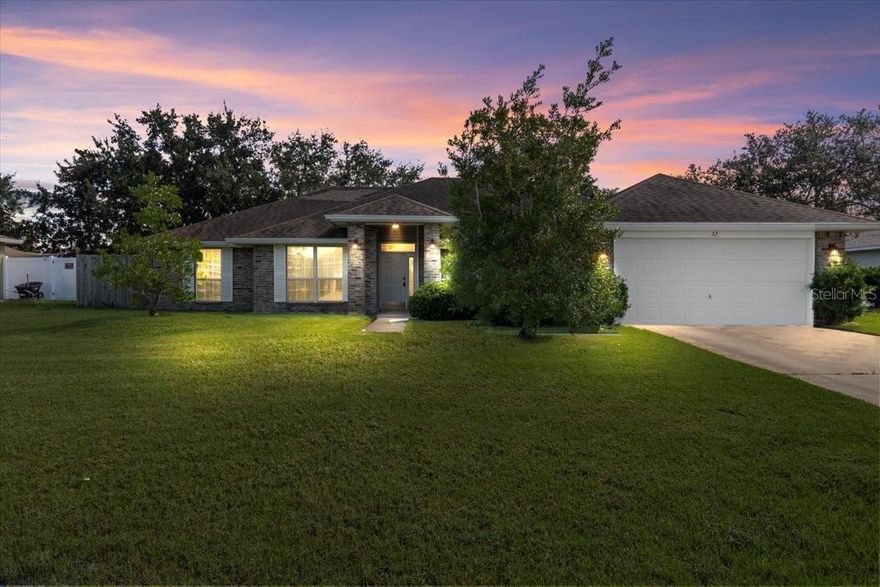 Spacious 4-bedroom, 2-bath Adams-built brick home offering 2,274 square feet of comfortable living space—an exceptional value for the size and location! Designed for easy living, this home features an open floor plan with volume ceilings, a formal living and dining area, and a large great room that opens to the kitchen—perfect for gatherings and everyday living. The formal living and dining rooms currently have sliding track doors that can easily be removed for an even more open layout. Every room in this home offers generous space, including bedrooms large enough to accommodate full-size adult furniture comfortably. The split bedroom design provides privacy, and the fenced backyard is ideal for kids, pets, or weekend BBQs. Major updates include a roof (2017), HVAC (2019), and water heater (2020). Located in the desirable Pine Lakes section of Palm Coast, you'll enjoy quick access to I-95, US-1, shopping, dining, and beautiful area beaches—plus an easy commute to both Daytona Beach and St. Augustine. This is a fantastic opportunity to own a spacious brick home that offers both quality and value. All information taken from the tax record, and while deemed reliable, cannot be guaranteed.