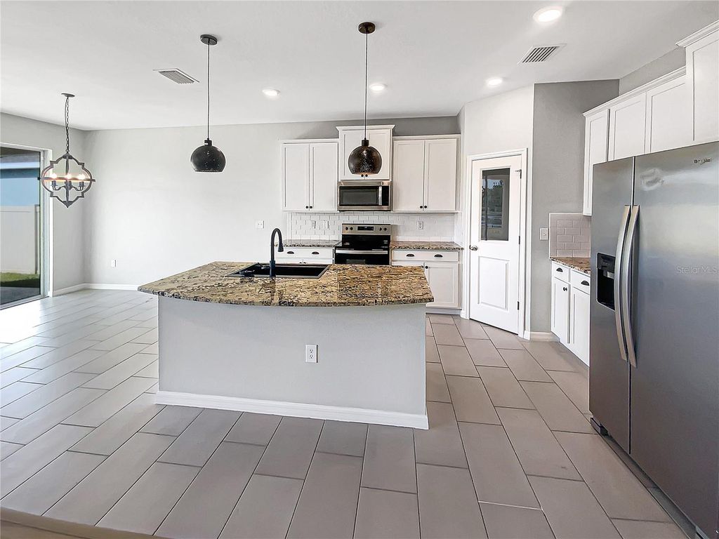 Photo of 3103 Living Coral Drive, Odessa, FL 33556 (MLS # O6360089)