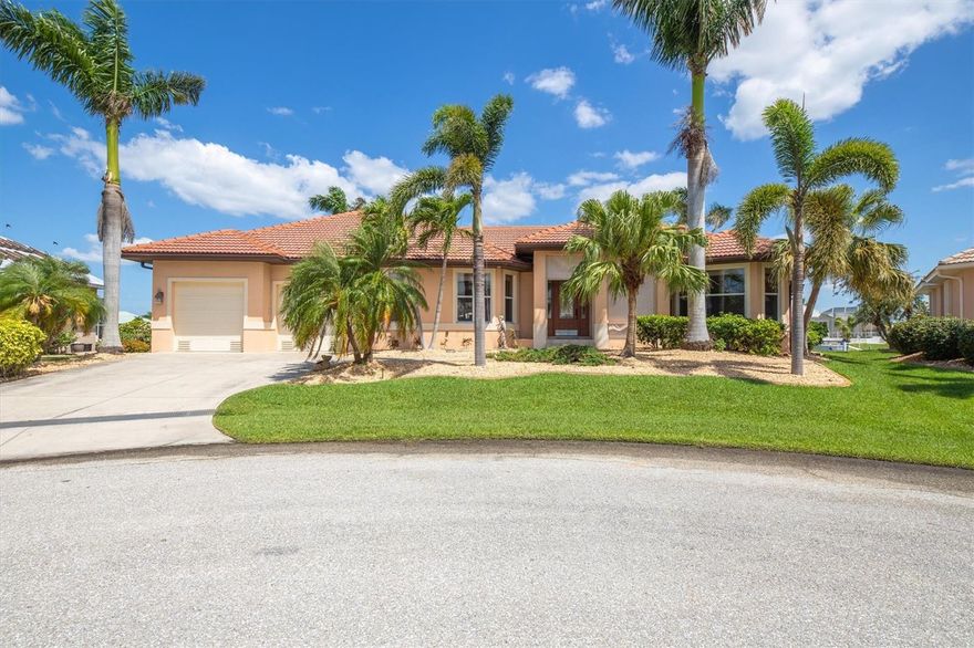 Beautifully appointed and well cared for Waterfront home in Punta Gorda Isles with sailboat access to Charlotte Harbor.  This home has 134 ft of waterfront with a boat lift that is rated for 33,000#s with electric and water. This home is located on a rim canal and is 10 minutes to the Gulf. The interior of the home features a chefs kitchen with granite counter- tops, center island, breakfast bar, stainless steel appliances, under cabinet lighting, prep sink, convection oven and warming drawer. There is tile throughout the main living areas and a spacious open floor plan with a formal dining room, den/office and great room with pocket sliders that open to the pool.  Every room has a amazing view of the water and pool.  The primary bedroom has a large walk-in closeet, en-suite bathroom with double sinks and a huge walk-in shower.  There are sliders in the primary bedroom with direct access to the pool area as well.  This home boasts a split floor plan and one bedroom features a murphy bed and 1/2 bath with pool access.  Tropical saltwater pool with heat pump that is screened in and has a spectacular view of the canal.   There is an outdoor shower too.  The garage is oversized with a work-shop space and the home has complete hurricane protection.  This home will be getting a brand new roof prior to closing.