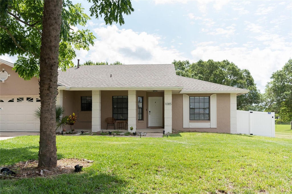Photo of 1085 Indian Ridge Trl E, Kissimmee, FL 34747 (MLS # O6446053)