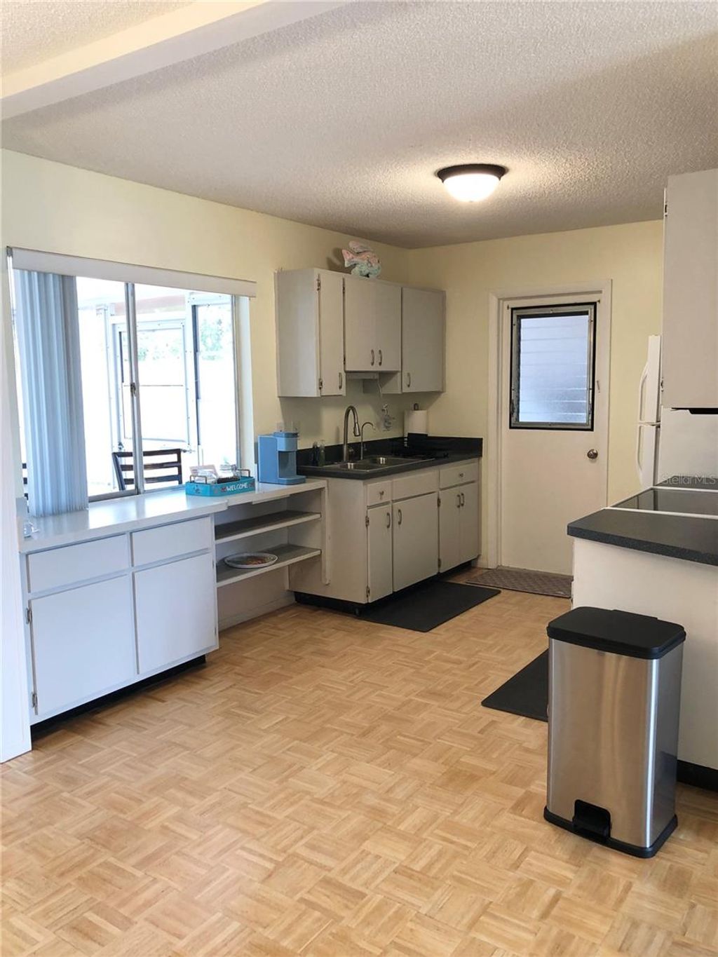 Photo of 119 Oldenburgh Court NE, Port Charlotte, FL 33952 (MLS # A4676774)