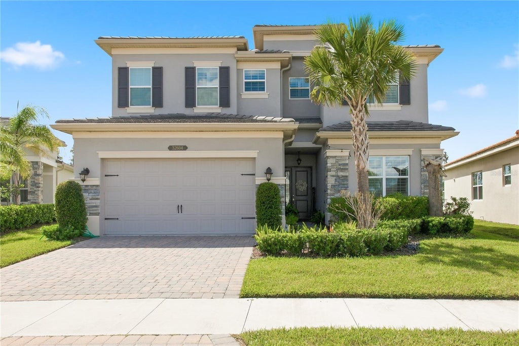Photo of 32604 Tree Of Life Avenue, Wesley Chapel, FL 33543 (MLS # TB8554390)