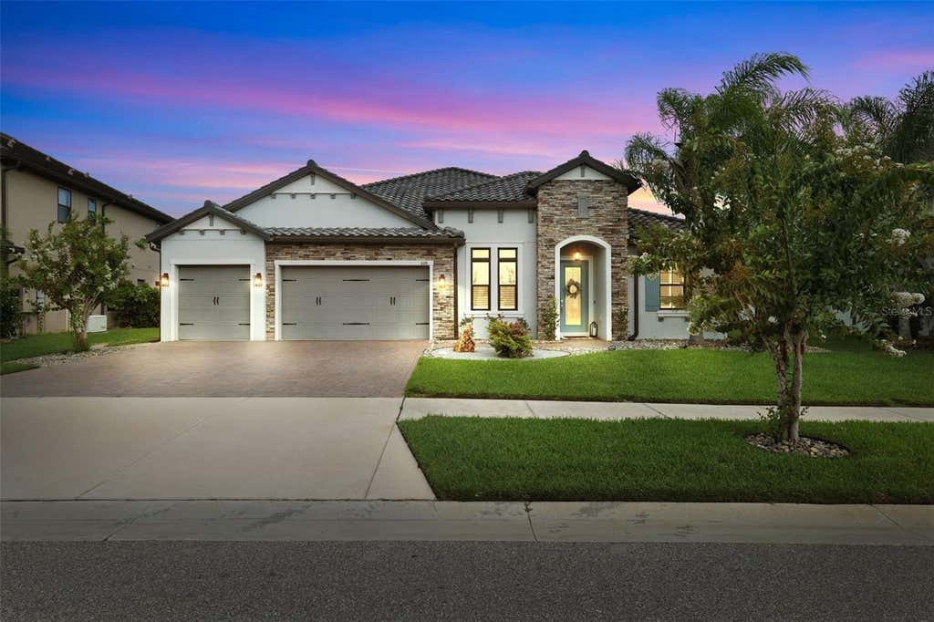 Photo of 6126 Marsh Trail Drive, Odessa, FL 33556 (MLS # TB8528337)