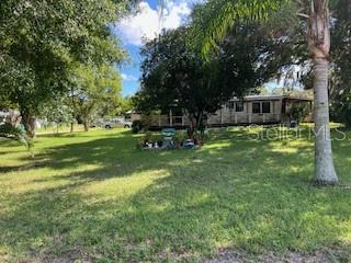 THIS IS A BEAUTIFUL HORSE FARM LOCATED IN FLORIDA. Bring your horses to this horse friendly community. This 6.07 acres is high and dry with canals running East/West and North/South for excellent drainage. Property is located on a very quiet dead-end street with lots of privacy. Pasture is fenced and crossed fenced with access to large 125 x 30 ft barn made of cypress boards and telephone poles making this a very safe and sturdy barn for horses plus each stall has a window shutter that can be closed during a hurricane for extra safety. Barn has 13 stalls (3 open up to large pasture, 2 open up to smaller pasture) 2 wash racks, tack room, feed room and laundry room. Property is 2 blocks from Brevard Horseman's Club (check Facebook for shows and other activities) and horse trails nearby as well. There is a recently renovated 24X48 manufactured home near the entrance drive way. The manufactured homes and Mobile home are sold "AS IS" and "WHERE IS". The front of the property has a 22.5 x 24.5 shed with a covered attached carport. A single wide mobile home plus a cottage are on the property for convenience only, as they need work. The back has a large building that has been used for farm equipment, construction equipment and a work shop. All outbuildings have partial or complete cement floors plus all buildings have water and electricity. New owners can subdivide property (check with code enforcement for requirements) as property has a metered electric pole in front and a separate one in back of property plus septic in front
and back of property. This property even has 2 full RV hook ups (check with code enforcement for any restrictions). This is a beautiful piece of property that can be used for a variety of purposes or take the mobile homes off and build your dream home. Truly a remarkable place for family vacations. Don't miss this opportunity. Call for more information.