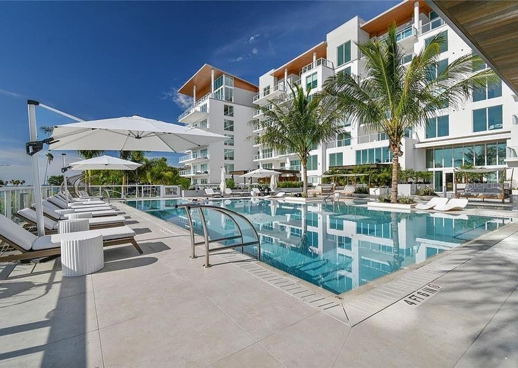 Photo of 1020 Sunset Point Road #111, Clearwater, FL 33755 (MLS # TB8509493)