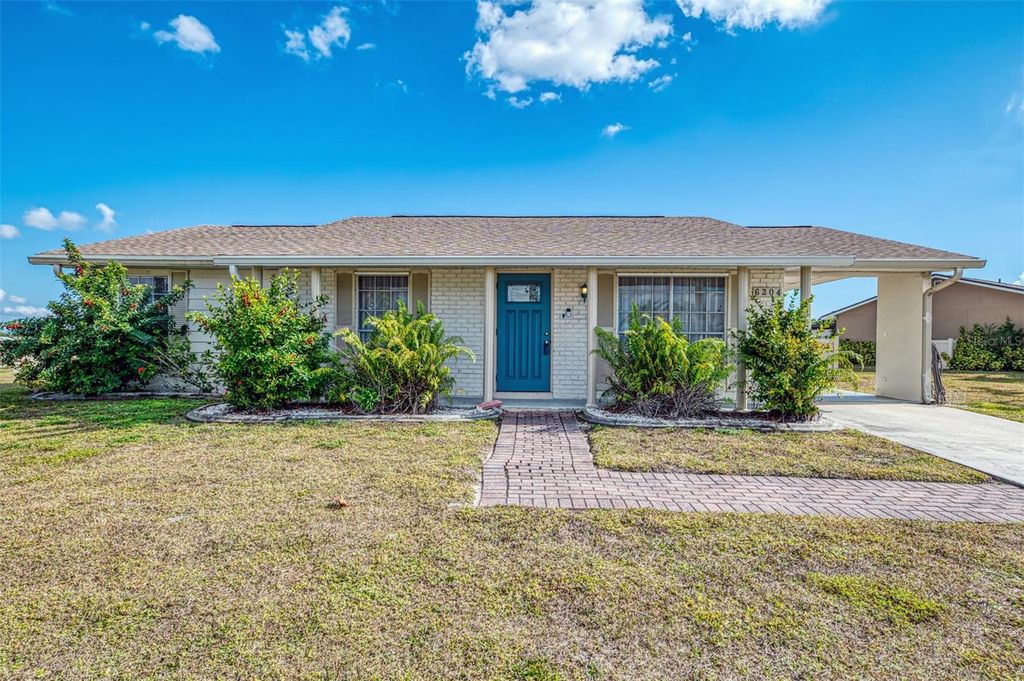 Photo of 6204 Thorman Road, Port Charlotte, FL 33981 (MLS # C7519739)