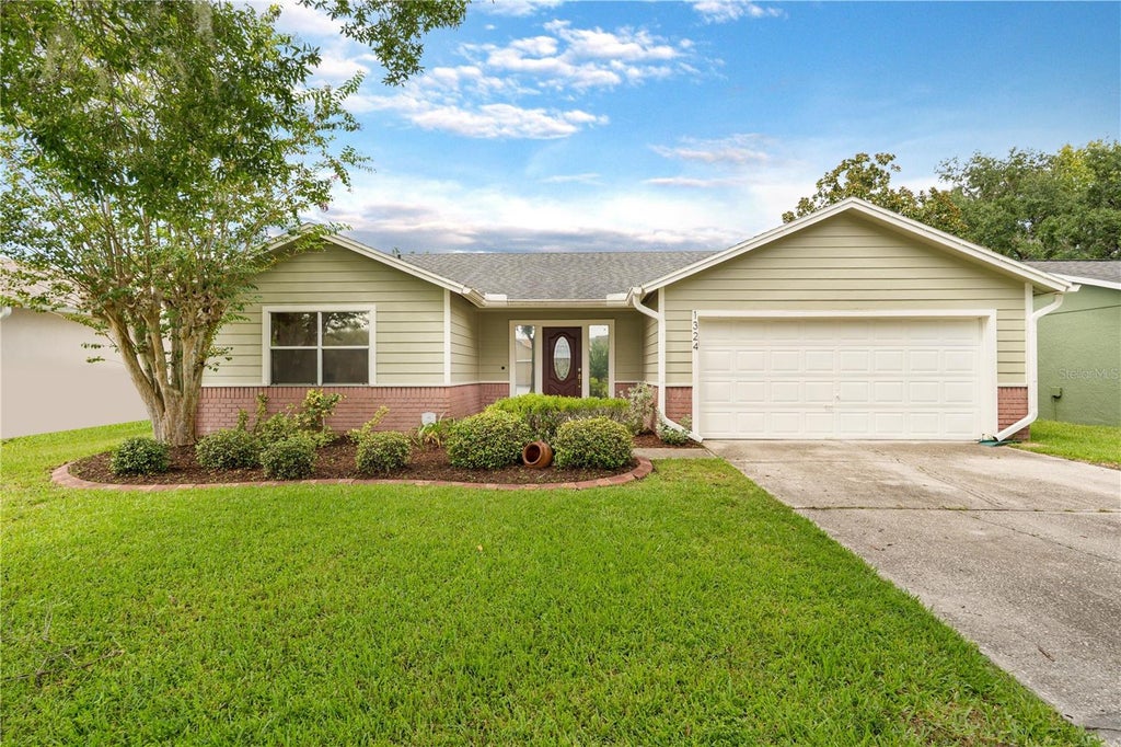 Photo of 1324 Silverthorn Drive, Orlando, FL 32825 (MLS # O6441082)