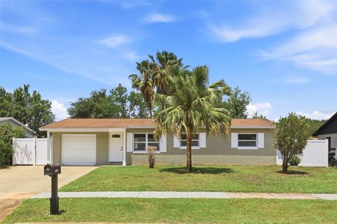 Photo of 5465 Lescot Lane, Orlando, FL 32811 (MLS # O6404202)