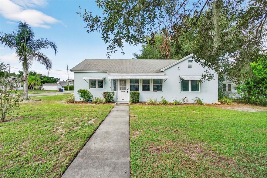 Investor Special in Lake Wales – ideal for a flip, rental, or your next DIY project! This super cute 3 bedroom, 2 bath concrete block bungalow is loaded with potential and brimming with character. Perfectly situated on a spacious corner lot in the heart of historic Lake Wales, this property offers a great opportunity to add value in a community that’s seeing renewed energy and growth. Step inside to find a bright and inviting Florida room filled with natural light, glass décor shelving, and peaceful views of the tree-shaded yard. The home’s living spaces retain the timeless character of the era with textured plaster walls, original glass French doors, and even an old-fashioned stove that adds a touch of nostalgia (and yes, there’s definitely central heat and air!). The cozy great room offers plenty of space for relaxing or entertaining, while the functional kitchen provides ample cabinetry, generous prep space, and lots of windows to keep the space cheerful and bright. Two comfortably sized bedrooms are located on one side of the home, with the third bedroom toward the back featuring a private en-suite bath with shower and convenient hanging space in the adjoining laundry area. The screened back porch is perfect for relaxing or entertaining, offering a peaceful spot to enjoy morning coffee or evening breezes. The fenced backyard provides space for gardening or play, while the shed adds storage and the carport offers protected parking. Notable updates include a 2024 Rheem water heater, 2022 Carrier A/C system, 2013 double-pane windows, 2005 roof, and Square D breaker panel. This home also benefits from city water and sewer connections, making it a great foundation for a renovation. Beyond the property itself, this home’s location is what truly shines. Downtown Lake Wales has recently been revitalized and is now bustling with boutique shops, locally owned restaurants, coffee houses, and vibrant gathering spots that capture the town’s historic charm and welcoming small-town feel. Spend your weekends exploring the local farmers markets, community festivals, and live music events that fill the town’s active social calendar. Just minutes away, you’ll find the world-famous Bok Tower Gardens—a serene landmark surrounded by lush gardens, walking trails, and year-round events. For those who love the outdoors, stroll down to Lake Wailes to take in the tranquil views and get your daily dose of exercise on the 4.5-mile walking and biking trail that meanders along the lake’s edge. Surrounded by natural beauty, culture, and small-town character, this charming bungalow offers both lifestyle and investment potential in one of Central Florida’s most picturesque communities. Schedule your showing today and imagine the possibilities!