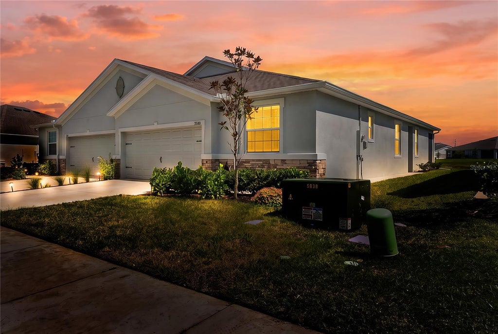 Photo of 8580 Bold Cypress Lane, Wesley Chapel, FL 33545 (MLS # TB8543952)