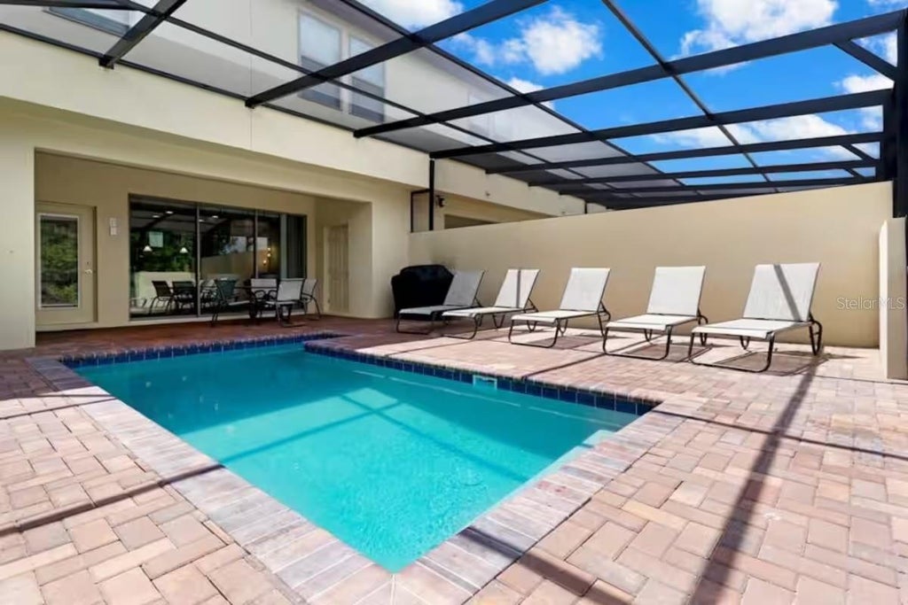 Photo of 8887 Geneve Court, Kissimmee, FL 34747 (MLS # O6446813)