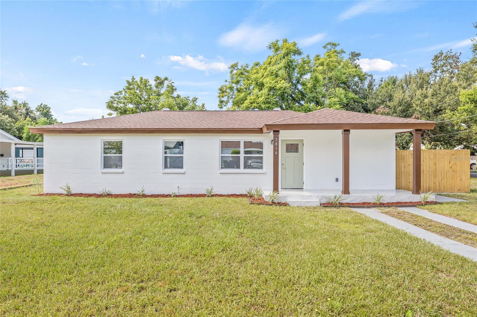 Welcome to this beautifully updated 3-bedroom, 2-bathroom home situated on a desirable corner lot in the heart of South Tampa. From the moment you arrive, you’ll be charmed by the inviting curb appeal and well-maintained exterior that set the tone for what’s inside. Step through the front door into an airy, open-concept floor plan where the living room, dining area, and kitchen flow seamlessly together—perfect for both everyday living and entertaining. The completely renovated kitchen features brand-new soft-close cabinetry, sleek quartz countertops, and a full suite of stainless steel appliances. A large island offers additional seating and prep space, ideal for casual meals or cooking your favorite dishes. The home features new flooring throughout, adding a fresh, modern touch to every room. The spacious primary suite is a peaceful retreat with a stylish ensuite bathroom featuring trendy finishes and thoughtful design. On the opposite side of the home, you’ll find two bright guest bedrooms, a beautifully updated guest bathroom, and a laundry closet with a brand-new washer and dryer for added convenience. Outside, enjoy a generous backyard with a side patio—perfect for grilling, relaxing, or entertaining guests in the Florida sunshine. Additional updates include a brand-new roof and water heater (2025), and a recently installed HVAC system (2022), offering peace of mind for years to come. Located just minutes from everything—Downtown Tampa, Hyde Park Village, Bayshore Boulevard, and with quick access across the bridge to St. Petersburg—you’re truly in the center of it all. Surrounded by top-tier dining, shopping, and entertainment, this home offers the very best of South Tampa living. Don’t miss this move-in ready gem—schedule your private showing today!