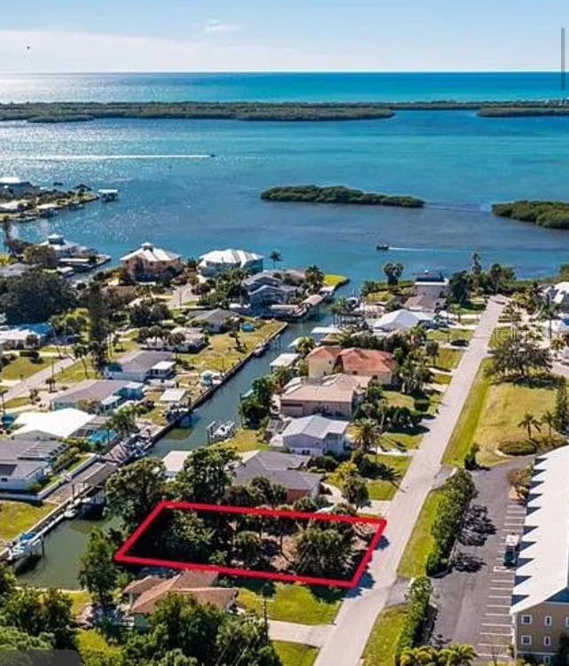 Discover the perfect canvas for your dream waterfront home at 1961 Oregon Trail, Englewood, FL 34224. This 0.21-acre (approximately 9,147square feet) vacant lot is nestled in the serene Grove City Shores community, offering an exceptional opportunity for those seeking the quintessential Florida lifestyle. Boater's Paradise: With immediate access to the Intracoastal Waterway and the Gulf, this location is a haven for boating enthusiasts and anglers alike. Community Charm: Grove City Shores is a sought-after neighborhood known for its tranquil ambiance and proximity to Englewood's pristine beaches, local dining, shopping, and recreational activities. Investment Potential: Vacant waterfront properties in this area are a rare find, presenting a valuable investment opportunity in a growing coastal community.