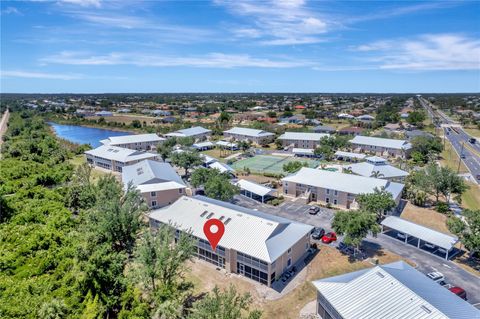 Photo of 9850 Fiddlers Green Circle #130, Rotonda West, FL 33947 (MLS # C7508701)