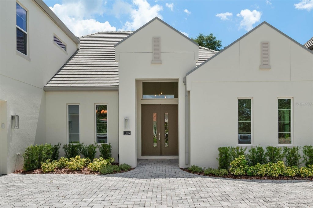 Photo of 1605 Manor Woods Way, Sanford, FL 32771 (MLS # O6412341)