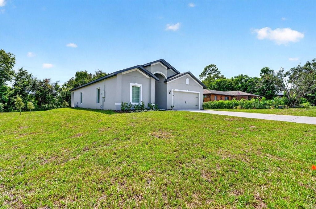 Photo of 1355 Indian Rock Court, Deltona, FL 32725 (MLS # V4951165)