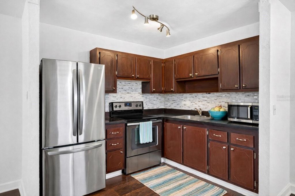 Photo of 1801 Bedford Lane #27, Sun City Center, FL 33573 (MLS # TB8491073)