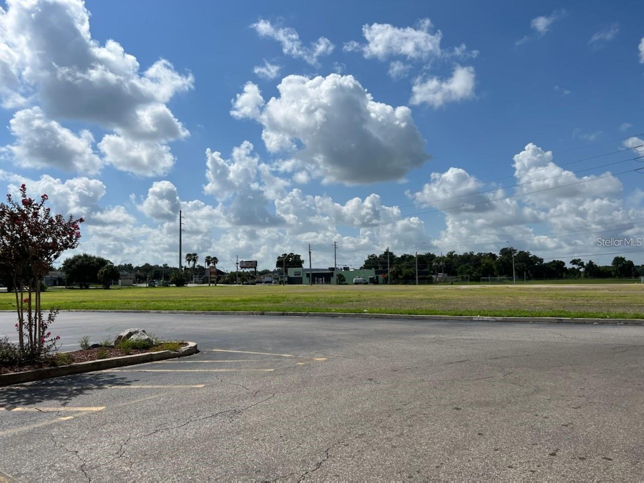 ORANGE BLOSSOM SHOPPING CENTER - Land