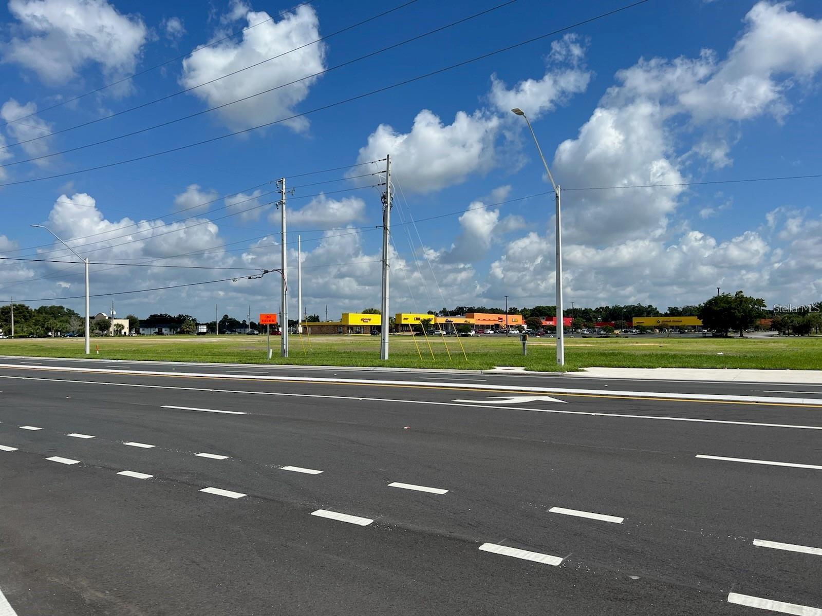 ORANGE BLOSSOM SHOPPING CENTER - Land