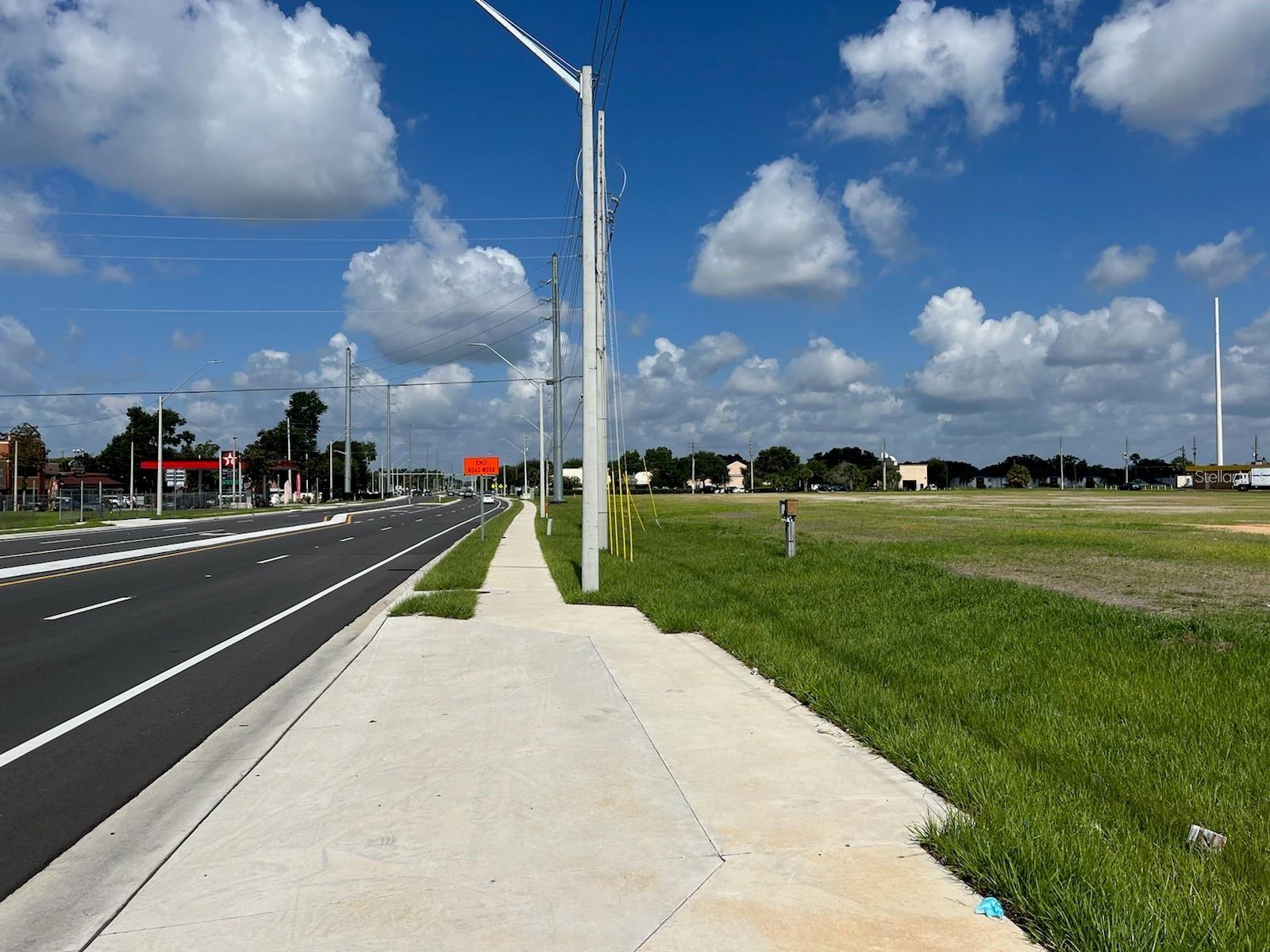 ORANGE BLOSSOM SHOPPING CENTER - Land
