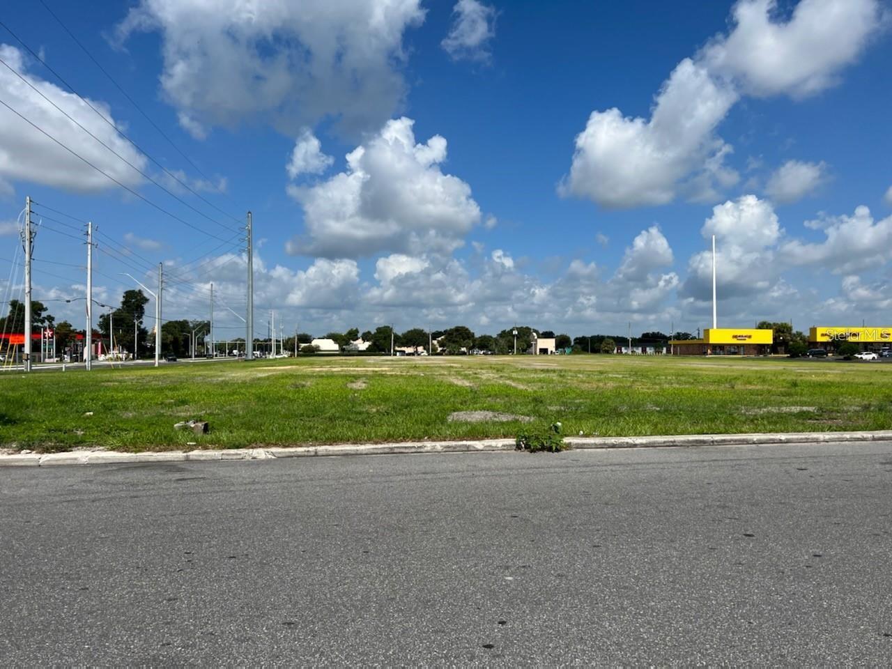 ORANGE BLOSSOM SHOPPING CENTER - Land