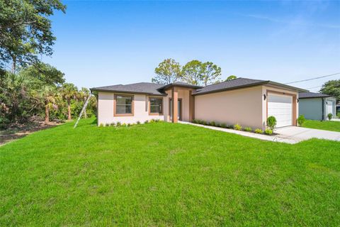 Photo of 81 Flamingo Boulevard, Port Charlotte, FL 33954 (MLS # TB8404545)