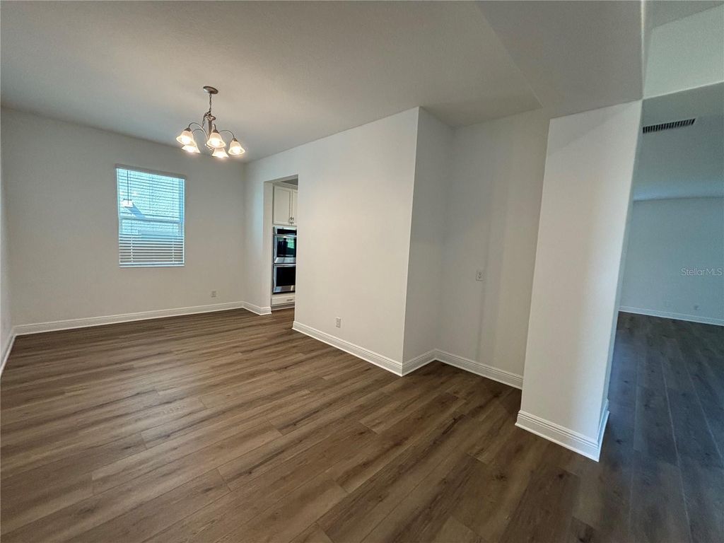 Photo of 6982 Rolling Gardens Loop, Groveland, FL 34736 (MLS # O6402424)