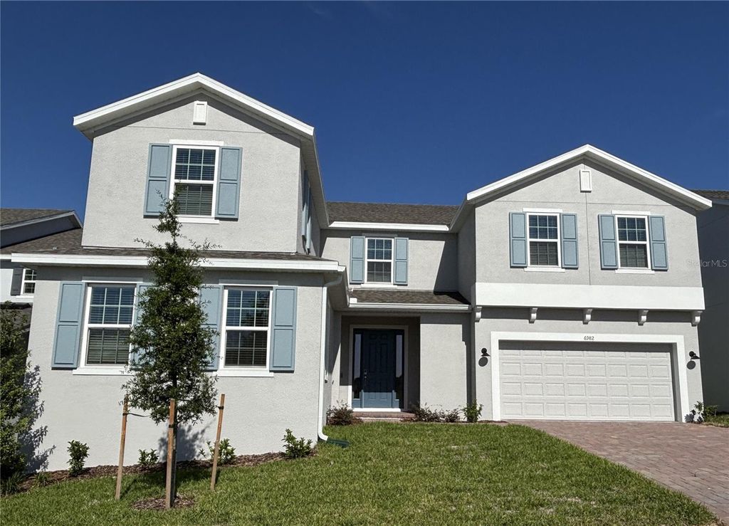 Photo of 6982 Rolling Gardens Loop, Groveland, FL 34736 (MLS # O6402424)