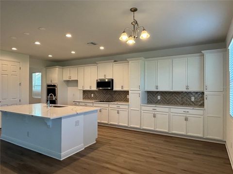 Tiny photo for 6982 Rolling Gardens Loop, Groveland, FL 34736 (MLS # O6402424)