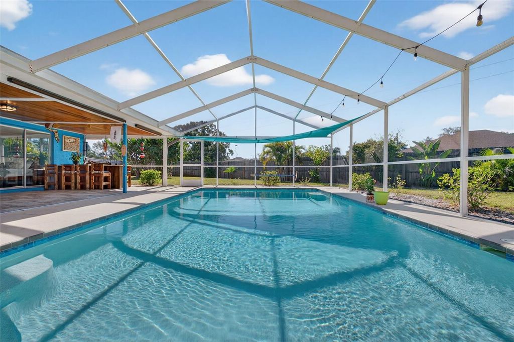 Photo of 701 Charlotte Avenue, Tarpon Springs, FL 34689 (MLS # TB8459527)