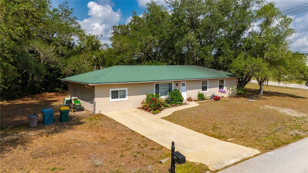 Photo of 4009 Yucatan Circle, Port Charlotte, FL 33948 (MLS # C7509547)