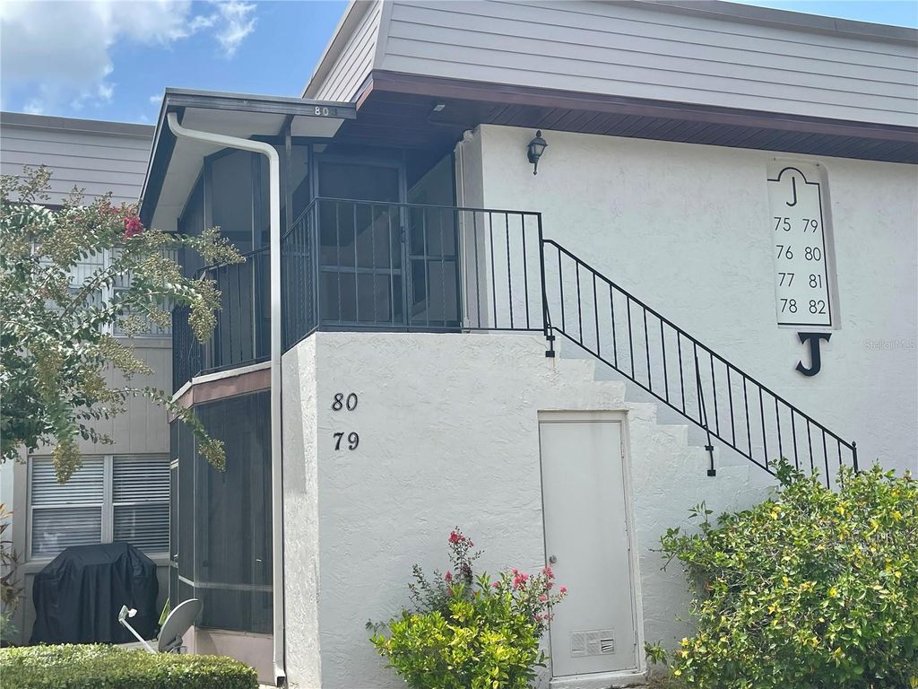 Photo of 80 Windtree Lane #203, Winter Garden, FL 34787 (MLS # O6394220)