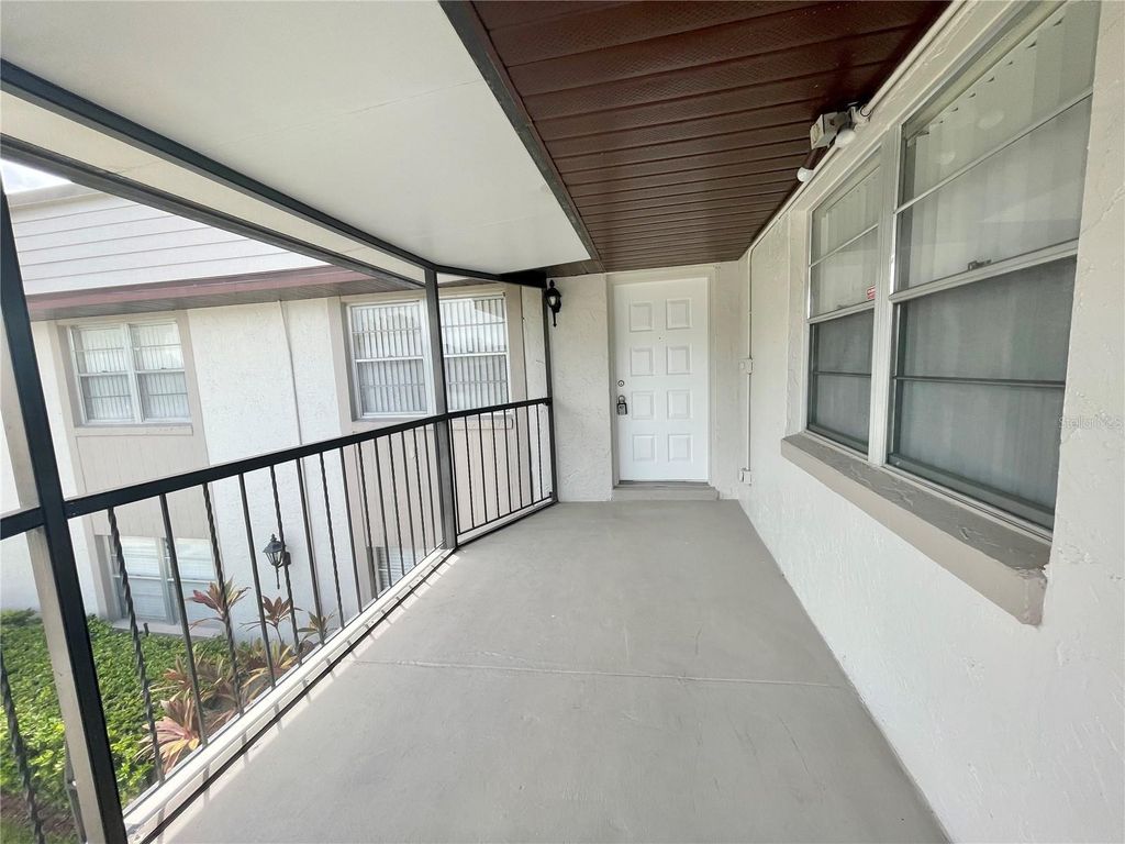 Photo of 80 Windtree Lane #203, Winter Garden, FL 34787 (MLS # O6394220)
