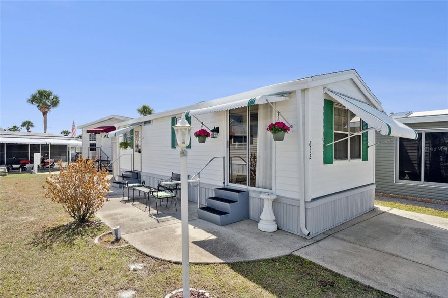 More Pictures coming soon! Welcome to Outdoor Resorts — where you don’t just own the home… you own the land.
This well-maintained 1 bedroom, 1 bathroom single-wide is being sold furnished. It’s completely move-in ready and ideal for someone looking for low-maintenance living without sacrificing comfort.
The home has been recently painted inside, newer flooring, a Wi-Fi thermostat, and a 4-year-old A/C. Step inside through the sliding glass door into a bright, open-concept living area that flows effortlessly into the fully equipped kitchen. The layout feels light, functional, and welcoming. You’ll find plenty of storage throughout, a clean and comfortable bathroom with a tub/shower combo and comfort-height commode, and a cozy bedroom. The stackable washer and dryer convey.
Outside, you’ll love the generous parking space and the large side patio added in 2014 — a perfect spot for morning coffee, evening cocktails, or gathering with friends.
And the lifestyle? That’s where this property truly shines. Outdoor Resorts sits directly on Lake Davenport and offers resort-style amenities including a 9-hole par-3 golf course, two swimming pools, eight bath houses, tennis courts, shuffleboard, horseshoes, private dock and boat access, and a very active clubhouse with cards, bingo, dinners, dances, arts & crafts, and morning coffee meetups. Don't forget about the new 9 hole lighted miniature golf course in the community as well!
The quarterly HOA of $768 covers water, sewer, trash, basic cable, and ground maintenance — making this one of the best values around. 55+ community, one pet allowed. You’re also minutes from medical facilities, shopping, restaurants, grocery stores, and an easy drive to the theme parks. Ownership of the land is also a plus!