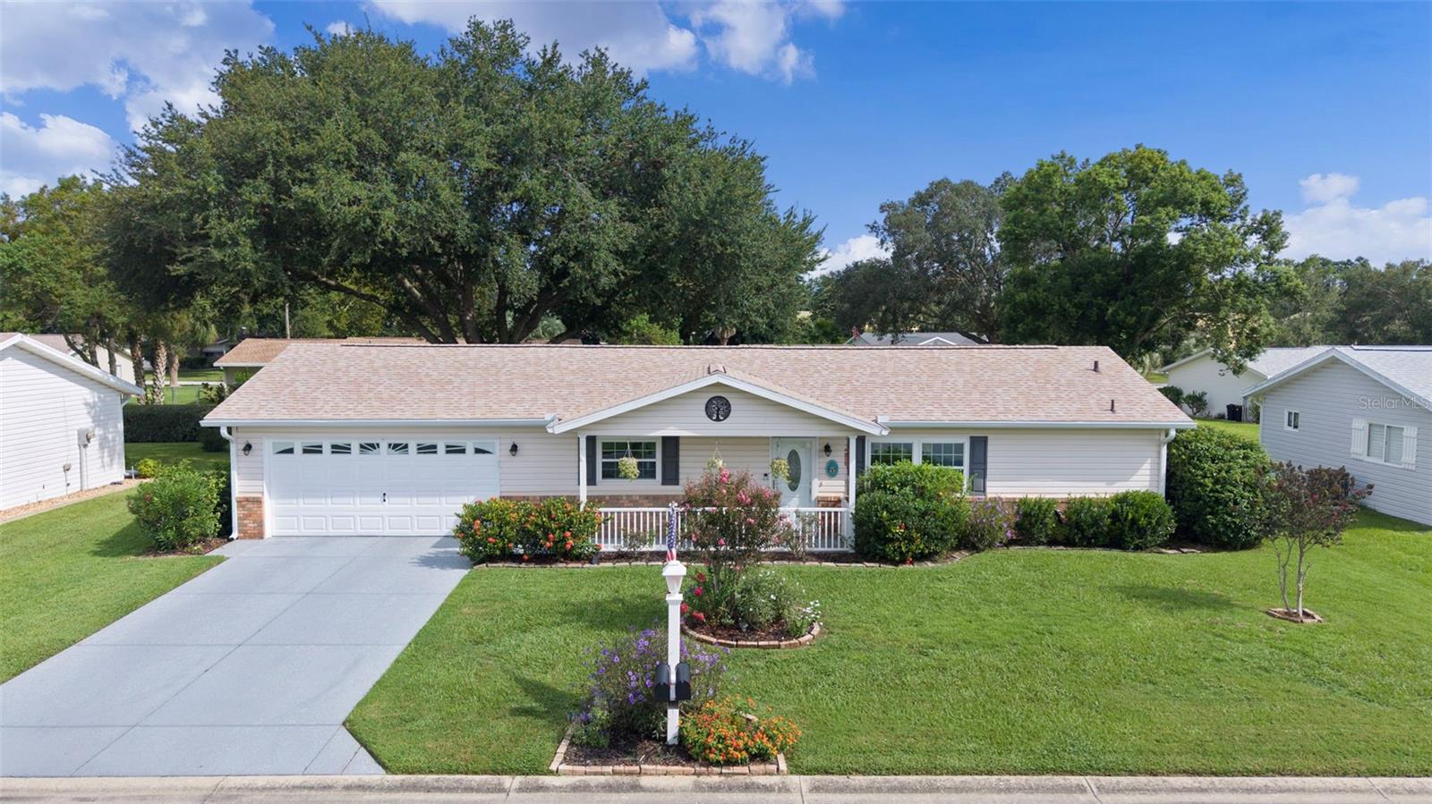 Welcome to 10815 SW 178th Street, located in the highly desirable Spruce Creek community. This beautifully maintained home offers peace of mind with a new roof (2023), whole-house water filtration system (2024), Econet heat pump water heater that doubles as AC for the oversized two-car garage (2020), a new garage door motor and opener (2025) and a well-maintained AC system (2015). With city water and sewer and the added benefit of being on the hospital electric grid, this home rarely experiences power outages.
Inside, you’ll find an updated kitchen and bathrooms featuring granite countertops, double sinks, and a walk-in tile shower in the primary suite. Energy-efficient double-pane windows throughout bring in natural light, while ample storage makes the home as functional as it is stylish. The enclosed and screened lanai with brand-new windows overlooks a large, fully fenced backyard with mature landscaping, creating the perfect space for relaxing or entertaining.
Living in Spruce Creek means access to a vibrant 55+ community with countless clubs and activities, while being just minutes from shopping, dining, and entertainment in The Villages, and with easy proximity to Ocala. This move-in ready home combines modern updates, community living, and an unbeatable location.