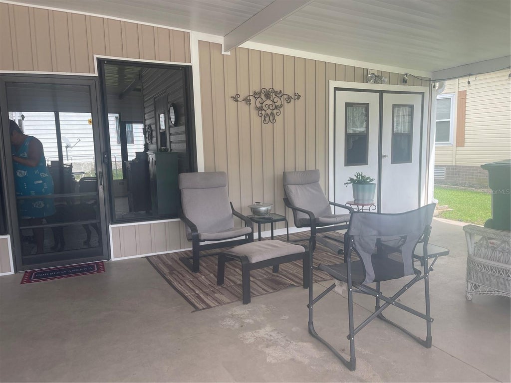Photo of 112 Lyonia Lane, Wildwood, FL 34785 (MLS # G5116181)