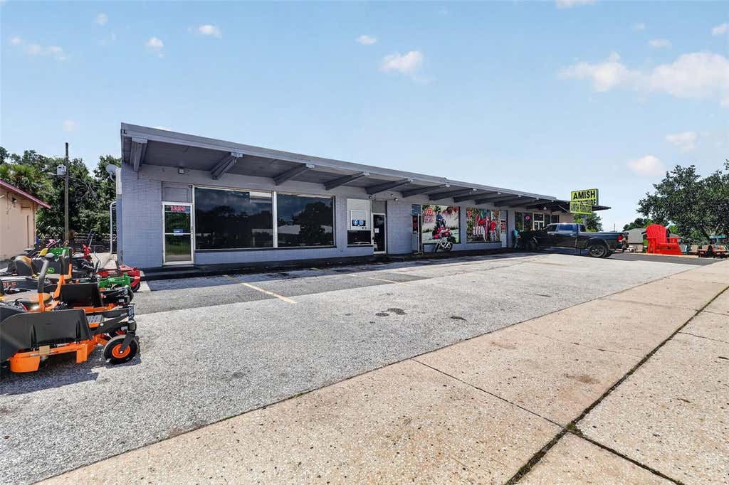 Photo of 1035 W Highway 50 Highway, Clermont, FL 34711 (MLS # O6432069)