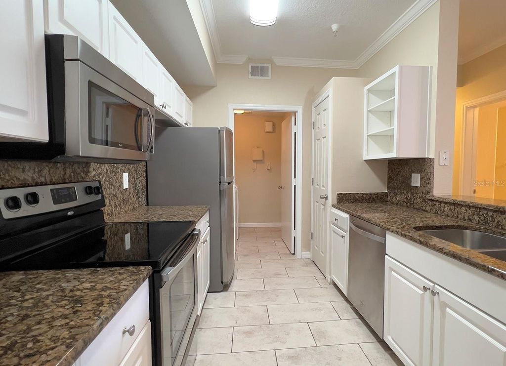 Photo of Orlando, FL 32811 (MLS # O6381022)