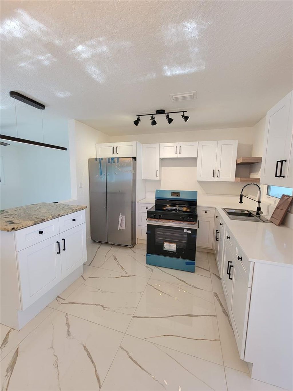 Photo of 7498 Orpine Drive N, St Petersburg, FL 33702 (MLS # TB8491832)