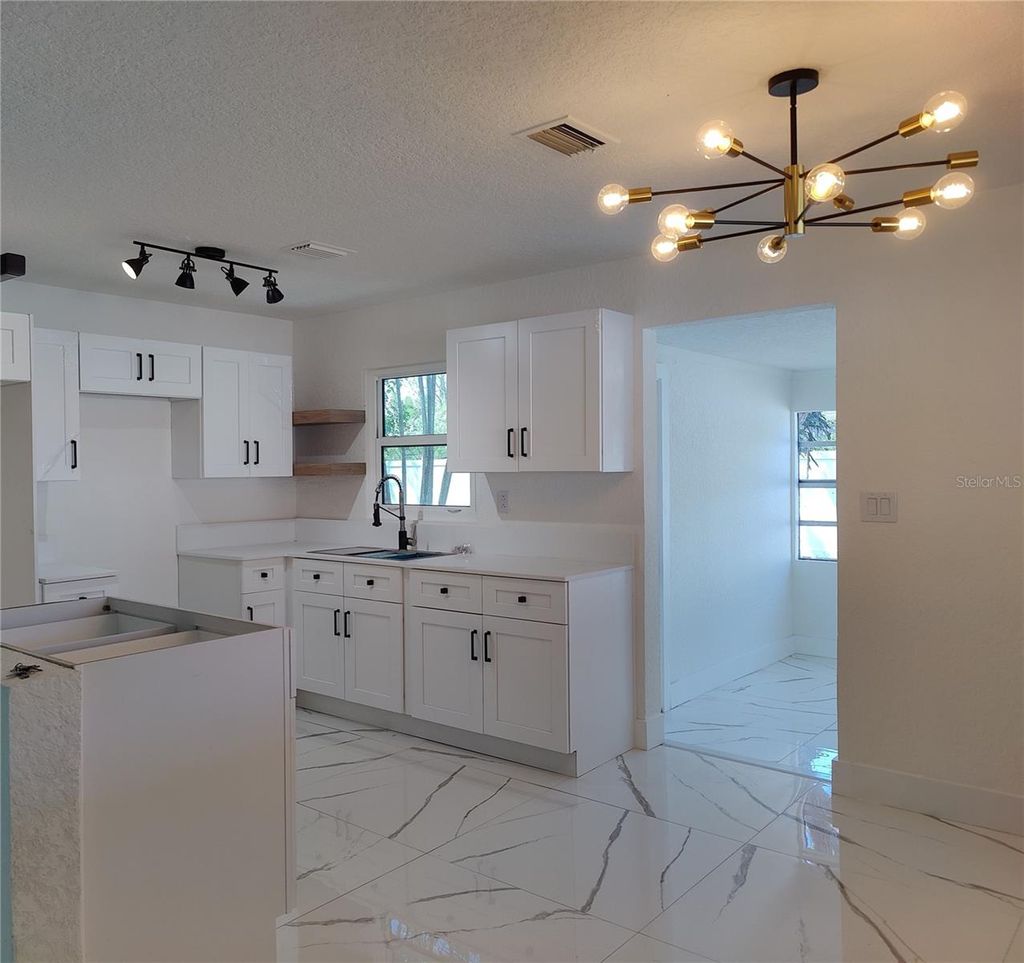 Photo of 7498 Orpine Drive N, St Petersburg, FL 33702 (MLS # TB8491832)