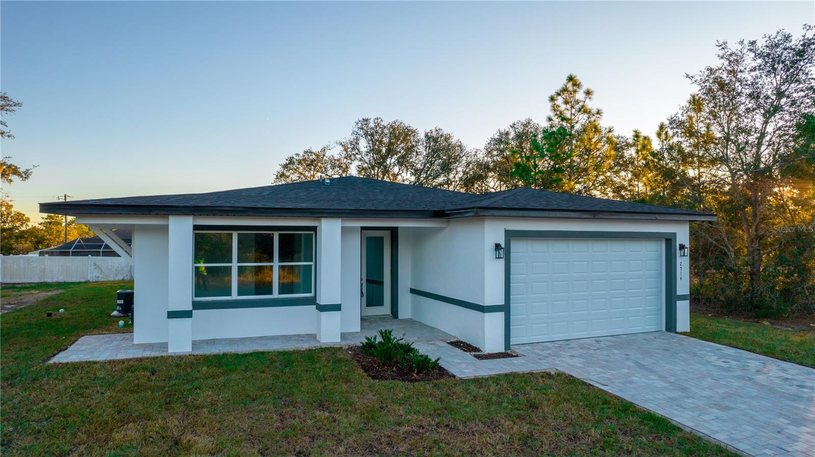 This listing represents 2 units. One main house for 1750 and number 2 is a studio for 1450. They can be rented separately. Brand new and ready to move in, this stunning 3-bedroom, 2.5-bath luxury home—*The Buckingham Flex* model by Queen Homes—is now available for rent with **no HOA** and unmatched flexibility. This is a bran new property under warranty with foam insulation for energy savings. Water and power will be at the landlord name and each unit will be billed 70% and 30% every month. Enjoy 10-foot ceilings, granite countertops, 42-inch solid wood cabinets, waterproof vinyl plank flooring, upgraded foam insulation, and spacious tile-covered showers. Located just 20 minutes from Ocala, 10 minutes from Dunnellon, and 35 minutes from Crystal River and the west coast beaches, this custom-built home offers both luxury and convenience. Built by Queen Homes, a trusted Central Florida builder since 2013, and includes a 2-10 home warranty.