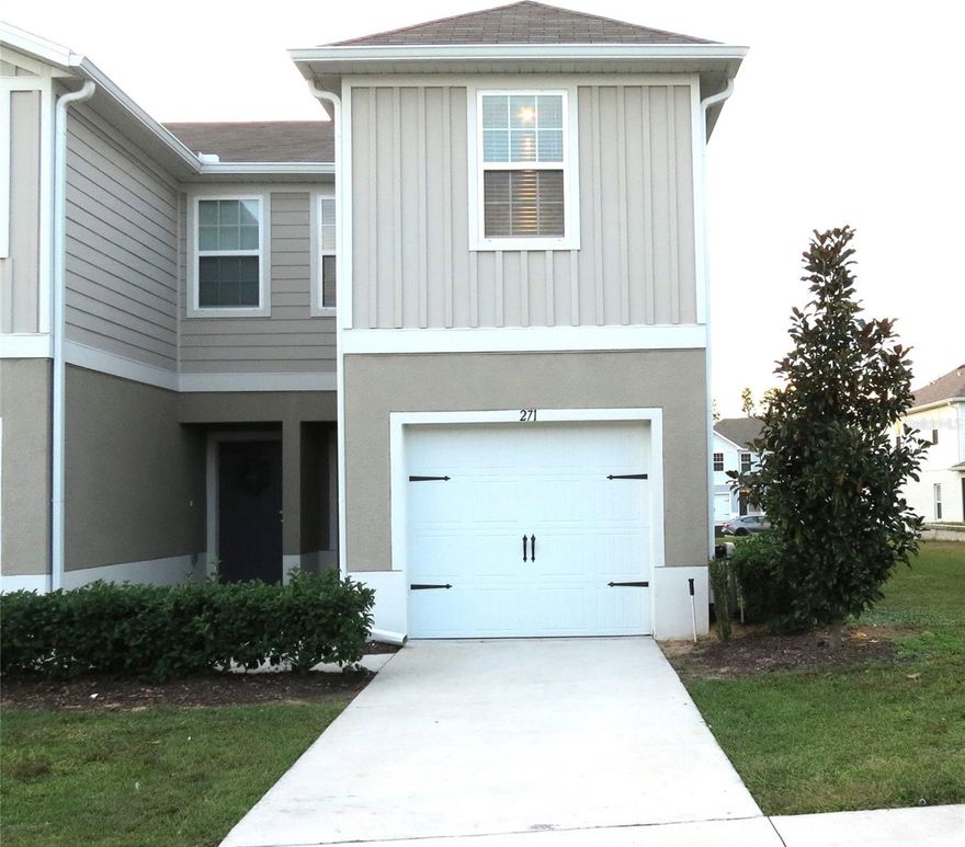 Welcome to this beautiful 3-bedroom, 2.5-bath townhome built in 2022. This great end unit offers lots of natural light thanks to extra windows. The open floor plan provides a functional layout. The spacious kitchen features rich espresso cabinetry, stainless steel appliances, a built-in microwave, granite countertops, spacious pantry and a nice island. The first floor also includes a half bath, tile flooring, and access to a screened-in lanai perfect for relaxing and enjoying the sunset. Upstairs, you’ll find a good-sized primary bedroom that includes a walk-in closet and an ensuite bathroom with double sinks. Convenient laundry closet with a stackable washer and dryer on the second floor.  Additional features include a one-car garage with epoxy floors, recessed lighting, and neutral paint colors throughout.  Conveniently located near a variety of restaurants, shopping, and just minutes from US-27 and I-4. Schedule your showing today!