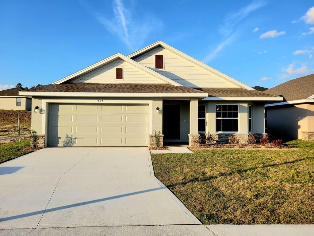 Photo of 1627 Ann Rose Way, Leesburg, FL 34748 (MLS # O6376436)