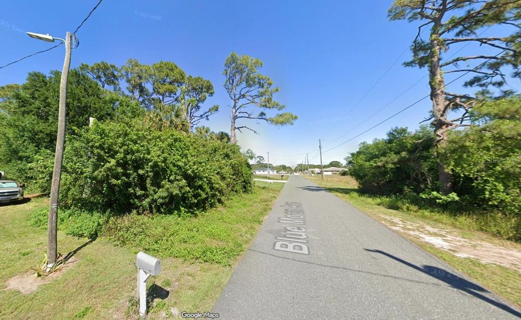 Photo of 107 Blue Moon Avenue, Lake Placid, FL 33852 (MLS # O6383673)