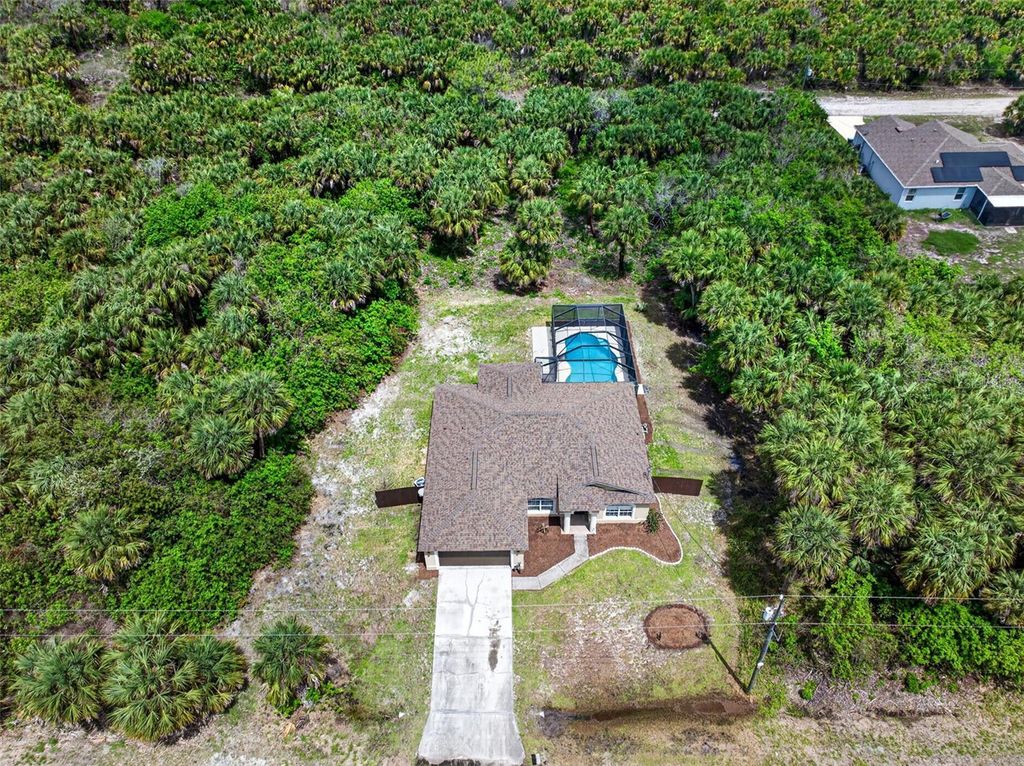 Photo of 831 Owl Street SW, Palm Bay, FL 32908 (MLS # O6410586)