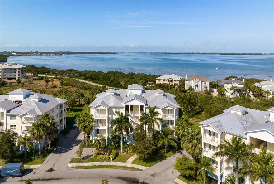 Beautiful Bayfront condo with great views and private location! This immaculate condo is in the desirable Parade of Homes award-winning Palma Sola Bay Club which is conveniently located close to shopping, dining, and entertainment. Just minutes away from the world-famous beaches of Anna Maria Island. Watch the beautiful sunsets over Palma Sola Bay from your own private balcony! This impeccably designed 3-bedroom, 2 1/2-bathroom condo comes FURNISHED and features a spacious OPEN CONCEPT living/dining room with breakfast bar opening into the kitchen. The custom details and ambiance must be seen to fully appreciate this gorgeous home. Including designer wood cabinets, granite countertops, crown moldings, ceramic tile flooring, walk-in California style closets, spa inspired baths, upgraded lighting fixtures, stainless steel kitchen appliances, and front loader washer/dryer. The spacious floor plan has high ceilings and 8’ doors which make this unit appear bigger than its already bountiful square footage. Two designated parking spaces are assigned under the building in addition to elevator access and a large storage locker for bikes and beach supplies. The superior constructed building offers reinforced concrete block construction on all floors, steel reinforced stem wall foundation system, reinforced concrete balconies, impact rated exterior doors, and high impact double pain windows. The two-story clubhouse has an observation deck, fitness center, billiards table, social room and kitchen. Outside enjoy a heated pool with an expanded deck for lounging, fire pit, and entertainment space complete with a wet bar and gas grill. This Key-West Styled gated community boasts 30-acres of preservation land, tropical resort landscaping, three stocked ponds, walking trails, a dog park, putting green and a sunset dock on Palma Sola Bay. This fabulous Coastal home is move in ready to make it your full-time residence, vacation getaway, and/or rental investment property. Call for your private showing today!
