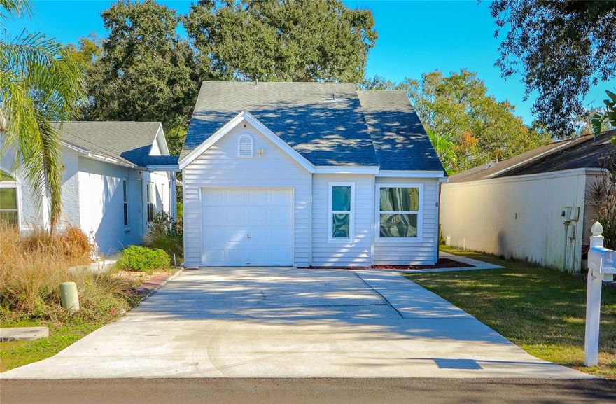 Charming 2-Bedroom Lake home retreat with NO FLOOD INSURANCE in Land O'Lakes!

Welcome to 4312 Venice Drive, where comfortable living meets an unbeatable location in the heart of Land O'Lakes. This cozy & delightful 2-bedroom, 2-bathroom home offers 909 square feet of thoughtfully designed living space, perfect for first-time buyers, downsizers, or savvy investors seeking exceptional value.

Step inside and discover the cozy living room, complete with a wood-burning firepit that creates the perfect ambiance for gathering with friends or enjoying quiet evenings during Florida's winter months. This unique feature adds warmth and character that sets this home apart from the rest.

The real magic happens when you step out back, where stunning lake views transform your outdoor space into a personal sanctuary. Imagine sipping your morning coffee while watching the sunrise dance across the water, or unwinding after work with nature's beauty as your backdrop.

Location truly shines here. Positioned just off US-41, you'll enjoy a stress-free commute to Tampa while maintaining the peaceful, residential feel of Land O'Lakes. Outdoor enthusiasts will appreciate the proximity to East Lake Padgett Park, located just over a mile away, offering endless opportunities for recreation. Daily conveniences are equally accessible, with Publix Super Market at Collier Commons nearby for all your shopping needs.

This attractively priced gem presents a rare opportunity to own a piece of lakefront tranquility without breaking the bank. In today's competitive market, properties like this don't last long.

Schedule your private showing today and discover why 4312 Venice Drive could be your perfect place to call home!