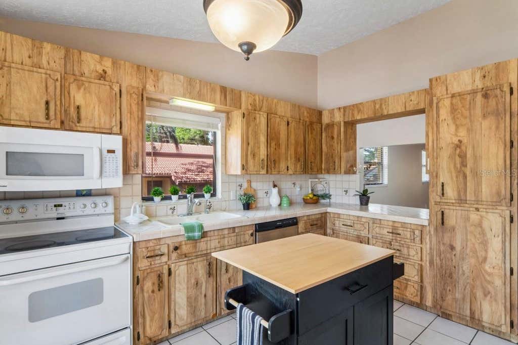 Photo of 8550 Shadblow Ct #6, Port Richey, FL 34668 (MLS # W7886763)