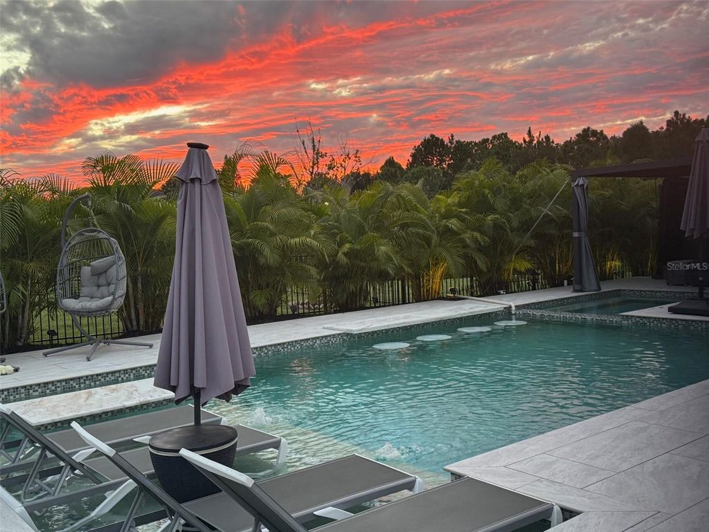 Photo of 3965 Aldea Way, Wesley Chapel, FL 33543 (MLS # TB8431166)